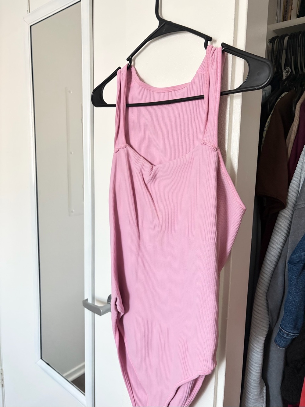 Light Pink Ribbed Sleeveless Bodysuit